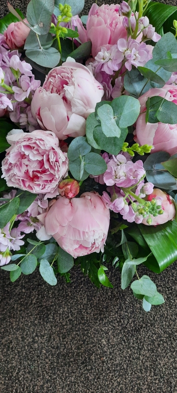 Loose posy of stocks and peonies