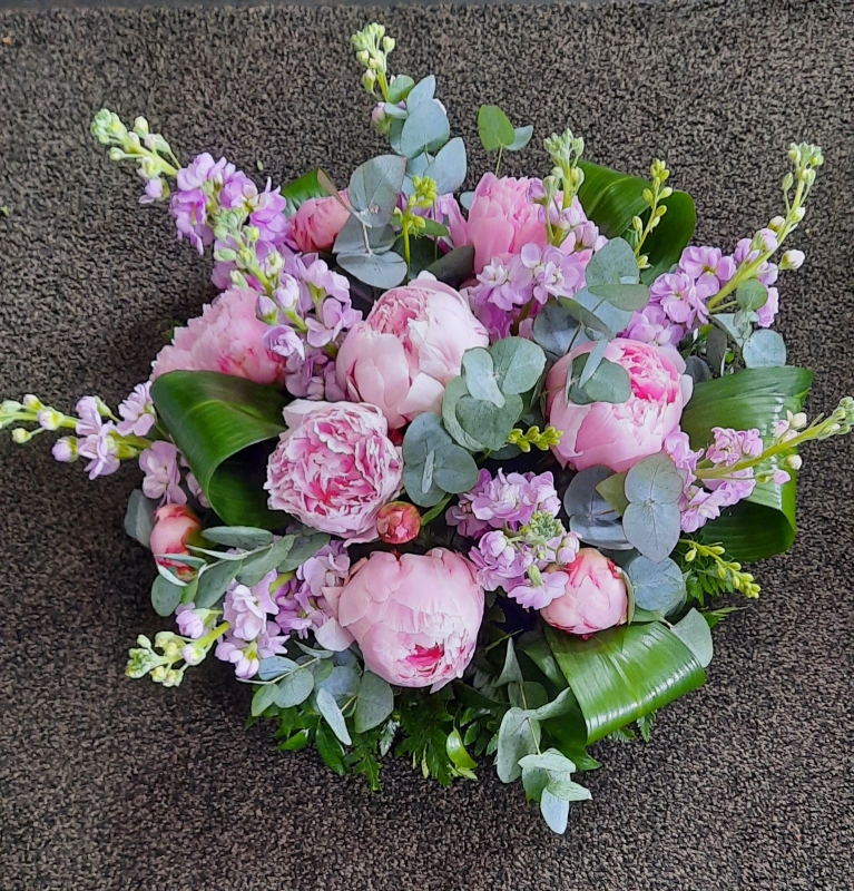 Loose posy of stocks and peonies
