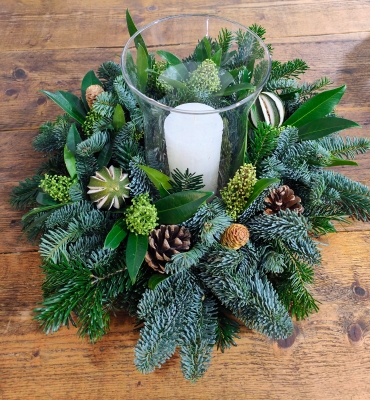 Festive Table Decoration With A Hurricane Vase