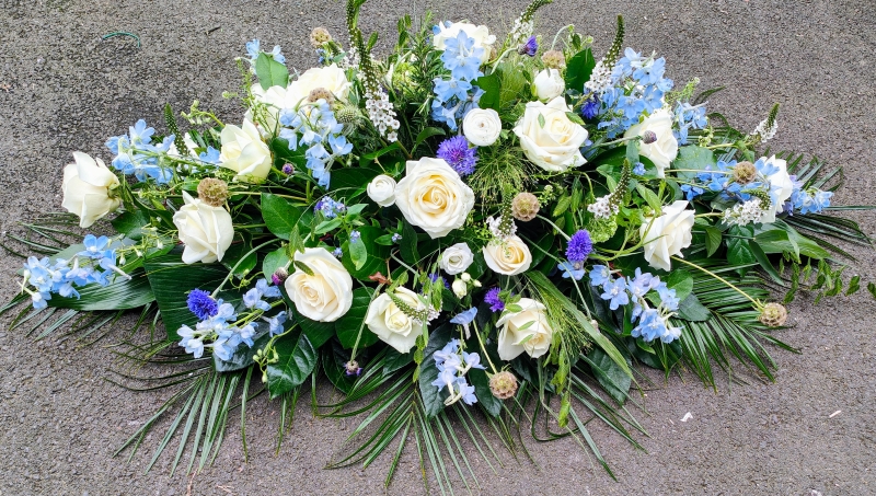 White Rose & Delphinium Casket Spray