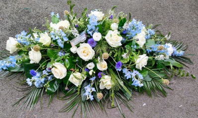 White Rose & Delphinium Casket Spray