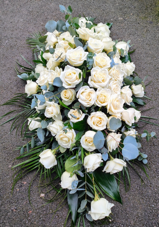 White roses casket spray