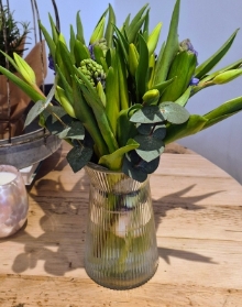 Blue hyacinths & yellow tulips vase