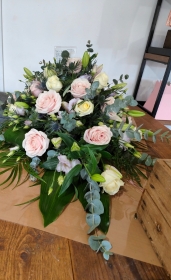 Rose Lilly and Lisianthus casket Spray