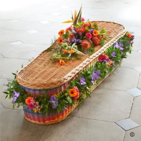 Vibrant tropical casket spray & garland