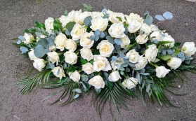 White roses casket spray
