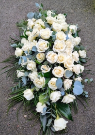 White roses casket spray